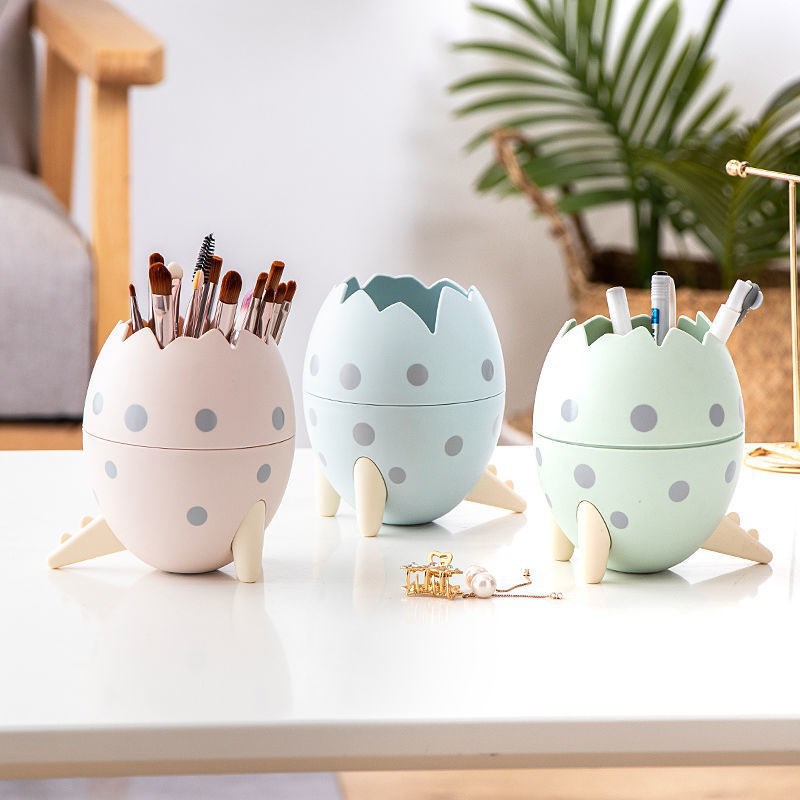 حافظة تخزين مكتبية ديناصور | Desktop Storage Box Pen Holder Organizer Eyebrow Pencil Glasses Dinosaur Egg Storage Bucket Fashion Cartoon